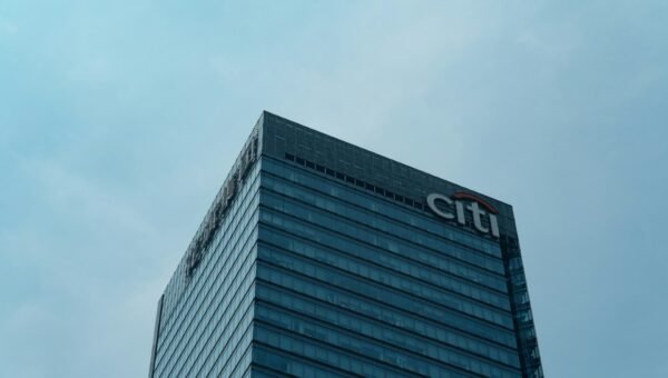 a tall building with a citi logo on it